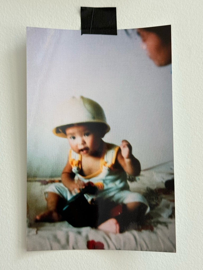 Baby Chang in a hard hat